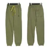 Rhude Pants Designer Fashion Pants Rhude Embroidered Slogan Drawstring Pure Cotton Leggingsユニセックスカジュアルルーズと快適なラベルとロゴ