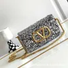 Diseñador Sequínas Bolsa Beeds Purse Fashionable Valeenttino Cadena de cuero Diagonal Diagonal Cross brillantes Bolsas cuadradas pequeñas Baguette High-End 0do0