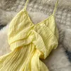 Robes décontractées été français soutien-gorge suspendu robe de sangle de cou vintage texture plissée longueur moyenne vacances