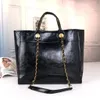 Bolsa de compras nova bolsa de praia bolsa de couro encerado bolsa feminina de alta qualidade estilo versátil marca de luxo bolsa de grande capacidade mini tn bolsa de designer bolsa de couro com pérolas incrustadas