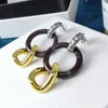 Dangle Earringsクラシックな不規則なダブルリングは、女性パーティーの高級ジュエリーのデザインで金属の半貴石を組み合わせます。