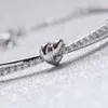 Pulsera Swarovski Diseñador Mujer Brazalete de calidad superior Amado Pulsera con nudo de amor brillante para mujer Pulsera con forma de corazón de cristal elemento para mujer