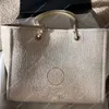 Bolso de diseñador clásico Bolso de playa de verano Carta de mujer Hombro Flash Oficina Alta calidad de lona con botón Bolsas de lujo retro