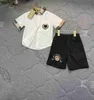 Marca bebê agasalho designer camisa polo conjunto tamanho 90-140 logotipo impressão meninos meninas camisetas e shorts de cintura elástica dez05