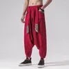 Pantaloni da uomo 2023 da uomo stile cinese con cavallo basso Harem pantaloni a gamba larga in lino uomo vintage incrociato da uomo