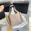 Sac à bandoulière en cuir véritable pour femmes et hommes, fourre-tout de styliste, sacs à main d'embrayage de luxe, sacs de plage à bandoulière