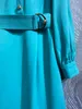 Blue dress standing collar, long sleeved belt, waist cinching dress, 2023 autumn new solid color, simple and slim fit, mid length skirt