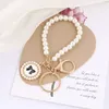 Creative pearl bow key chain men women exquisite lovely bag pendant beautiful party gift pink car key chain