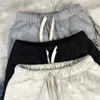 Mäns shorts Nya shorts män kvinnor 1 1 bästa kvalitet sommarstil dragkammare lapptäcke byxor t231214