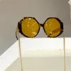 Polygoon vorm zonnebrillen goud zwart donkergrijze lens met ketting sonnenbrille occhiali da sole uv400 bescherming met box208h
