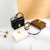 Neue Damen-Unterarm-Handtasche mit niedlichem kleinem Körper und vielseitigem Tofu-Einzelschulter-Handtaschen-Arbeits-Make-up-Datumsbeutel
