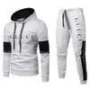 Moletom de moda Conjunto de moletom masculino e feminino com capuz de outono conjuntos de tracksuit de 2 peças roupas de corrida de jogger traje masculino de roupas de rua de inverno de inverno roupas