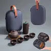 Tazze da tè Set da tè da viaggio cinese con sabbia viola Una pentola Quattro tazze portatili Kung Fu e 231214