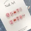 Falska naglar handgjorda korta kawaii kanin rosa press på naglar med jordgubbsdesign falska naglar med lim konstgjord nagelspets för flickor 231214