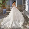 Saudiarabien Full spets sjöjungfru bröllopsklänning med löstagbart tåg sexig från axelbryggklänningar charmig lång mantel