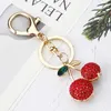 Creative Alloy Rhinestone Fruit Cherry Keychain Söt och fashionabla utsökta handväskbilhänge