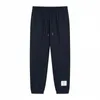 男子と女性のズボンパンツファッションブランドThombrownsweatpant Highバージョン秋/冬の新しい高級トレンドTB有名な同じスタイルのソリッドカラープリーツレギンス3x0i