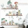 Cartoon Leuke Dikke Katten spelen op de plank Bonsai Planten Muurstickers Kinderkamer Muurstickers Woonkamer Slaapkamer Woondecoratie