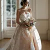 Superbe robe de mariée sirène sans bretelles avec train chapelle et appliques de luxe en dentelle scintillante en tulle trompette détachable