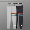 男子と女性のズボンパンツファッションブランドThombrownsweatpant Four Bars春秋新しいトレンディカップルカジュアルスポーツ太い綿m2o1