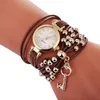 Montres-bracelets 100pcs / lot mode élégance clé pendentif envelopper autour de la montre en cuir quartz poignet décontracté pour les femmes en gros horloge