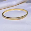 Bijoux de créateurs de mode pleins de diamants pour femmes, bracelet creux simple en acier titane qui ne se décolore pas, bijoux de design classique