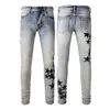 Nowe przybysze dżinsy słynne spodnie mężczyźni designerskie dżinsy 2023 Streetwear Casual Spits Projektanci dżinsowe spodnie Rozmiar 28-39 Proste dżinsowe spodnie