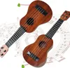 Teclados Piano 17 pulgadas Niños Ukelele Guitarra 4 cuerdas Mini Guitarra Niños Instrumento musical Juguetes educativos con púas para niños pequeños Principiantes 231214