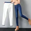 Kvinnors jeans vinter lamm fluff denim blyertsbyxor kvinnor tjockare stor storlek 34 hög midja stretch jeansy fleece fodrad varm smal vaqueros