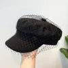 Berretti Cappello ottagonale in rete sexy da donna Cappello retrò blu scuro britannico che vende berretto selvaggio moda europea e americana 231215