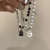 Bracelet en perles petit fantôme noir et blanc, accessoires pour petite amie, Niche Style froid, haut de gamme, doux et Cool