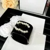 Bracelet de créateur Bracelets de luxe de mode femmes Bracelets diamant clouté perle noir résine Bracelet bijoux de haute qualité