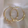 Boucles d'oreilles de créateur Sier Gold, grandes boucles d'oreilles légères pour femmes, avec un Design de Niche qui dégage un sentiment de tempérament et de tempérament