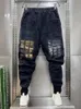 Мужские джинсы Street Hip Hop Мужские спортивные штаны-шаровары с сетчатой строчкой в дизайнерских брендовых стеках Свободные ковбойские брюки Модная одежда 231214
