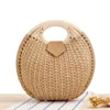 Kvällspåsar kvinnors naturliga rotting handvävd rund skal handväska topphandtag väska sommar mode boheme kvinnlig casual tote clutch strand