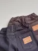 Pantalon printemps automne Ins garçon enfants rétro jean ample fille bébé solide coton pantalons décontractés enfant mode Denim salopette pour bébé