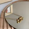 Hänghalsband Enkel vårhalsband för kvinnor flickor franska stil guldfärg titan stål charm kedjekedja smycken gåva (GN811)