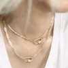 Ожерелья с подвесками Turandoss WomensGoldPaperC LipC HainN ecklace14 KGoldPlatedИзысканныйPaperCl ipChainNe cklaceMe dalEv ilEy eSt arLightningHe artB terfly