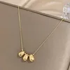 Correntes Dodohao 316L Aço Inoxidável Cor de Ouro Oco Waterdrop Beads Bola Pingente Colar para Mulheres Simples Não-Desvanecimento Gargantilha Jóias