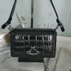 Bolsa feminina Saturn com design de nicho, bolsa baguete com padrão de crocodilo, bolsa crossbody na moda