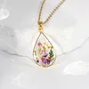 Collier pendentif en forme de goutte d'eau dorée, série de fleurs de lune, fleurs séchées naturelles, spécimen de plante, rose, cadeau créatif, nouvelle collection