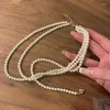 Chaines Collier de perle d'imitation blanche multicouche Vintage Élégants Perles de cou de la chaîne de cou féminin