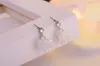 Boucles d'oreilles à étalon coréen flore flocon CZ Zircon