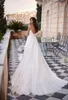 Sheer Neck A Line Wedding Dresses Pärlad paljett Back Bridal klänning med sidosporterad veck Satin Vestidos de Novia