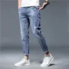 Mäns jeans Korea Casual byxor Ankellängd Högkvalitativ sommarsträcka bomullshål Thin Streetwear Design Denim 231214