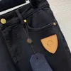 designer kvinnor jeans märke kläder damer byxor mode broderat logotyp läder dekorerad med elastiska byxor 15 december ny