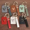 Marque de créateurs Porte-clés Porte-clés de voiture carrée de luxe pour hommes Porte-clés de mode pour femmes Ours Porte-clés en cuir artisanal pendentif accessoires