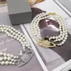 Luxury fashion designer three rows of pearls Saturn pendant necklace ladies pearl necklace diamond necklace exquisite high-end ladies jewelry Christmas gift