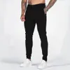 Pantaloni da uomo Autunno Casual Formale Bottoni Stretch Skinny Slim Fit Jogging Pantaloni sportivi da allenamento Leggings Matita 231215