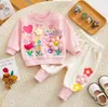 Set di abbigliamento Neonate Felpe con cappuccio 3D Applicazioni floreali Pullover rosa Sweatershirt Pantaloni da jogging a vita alta 2 pezzi Abiti per bambini 231214